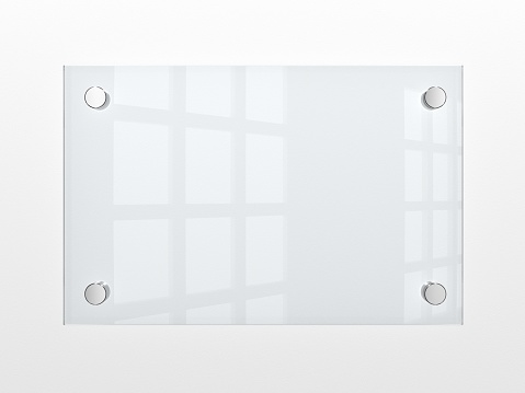 Closeup of wall-mounted blank glass nameplate. 3d illustration.