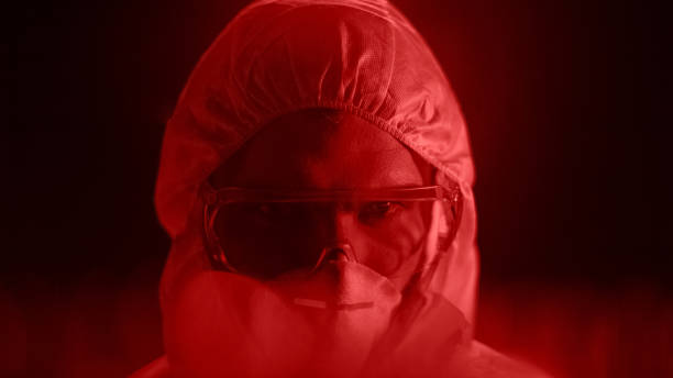 istock Male researcher in protective mask, biochemical danger, lab worker, radiation 1137646554