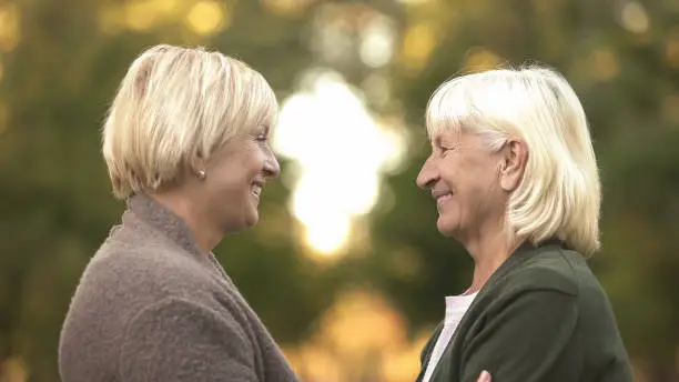 Senior female friends happy to see each other after many years, friendship