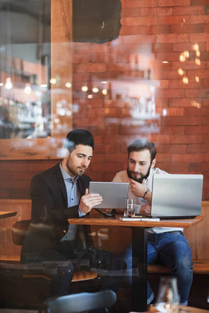istock two Businessmen talking in restaurant 1137648378