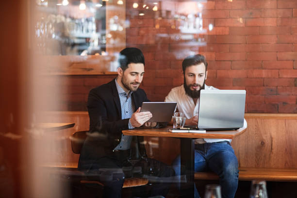 istock two Businessmen talking in restaurant 1137648458