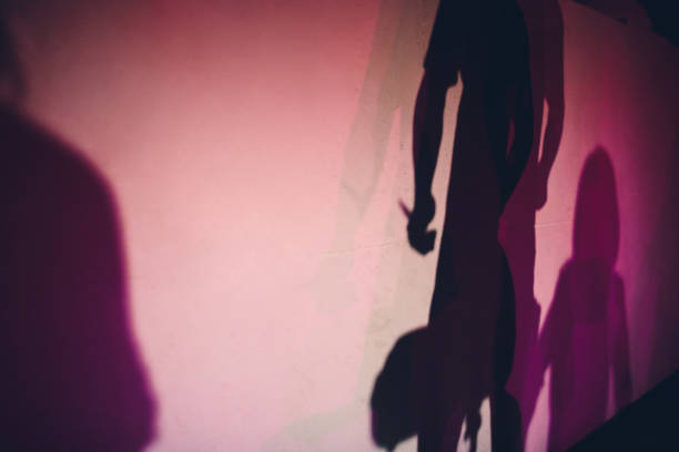 istock Shadow of a musician tuning his cello. 1137648468