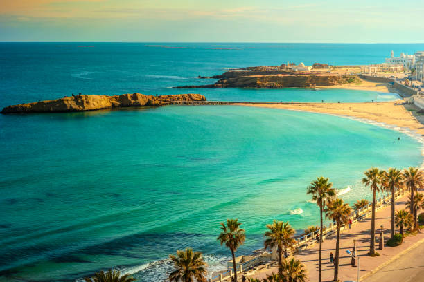 Monastir. Tunisia. Panoramic view of the city and the coast opens from the observation tower Ribat View of the Mediterranean Sea. Monastir. Tunisia. Panoramic view of the city and the coast opens from the observation tower Ribat tunisia beach stock pictures, royalty-free photos & images