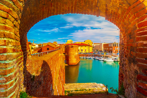 View of the landmark Fortezza Vecchia, an old fortress with a tower located in Livorno, Tuscany, Italy.