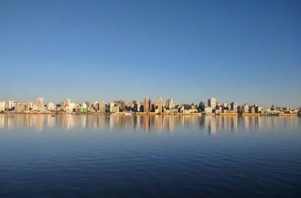 Panoramic view of Porto Alegre city from the Guaíba lake. The city is also surrounded by historical buildings and beautiful parks.