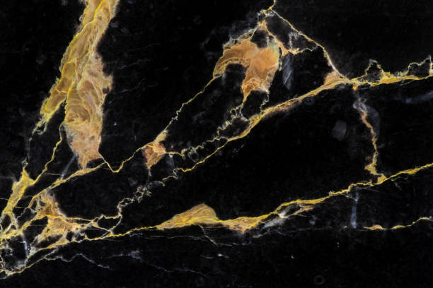 golden black marble luxury pattern background design golden black marble pattern luxury interior surface background design veining stock pictures, royalty-free photos & images