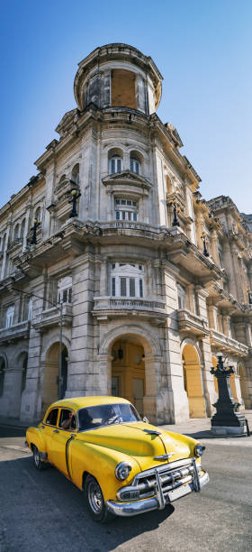 istock Vintage yellow oldtimer car driving through Old Havana Cuba 1137668879