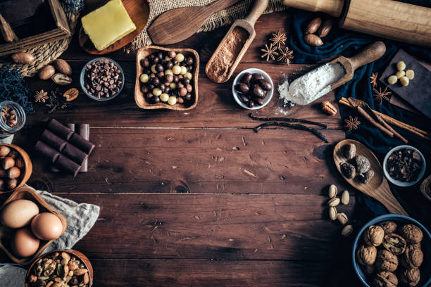 istock Ingredients for making chocolate mousse and cookies on a wooden table in a rustic kitchen 1137671481