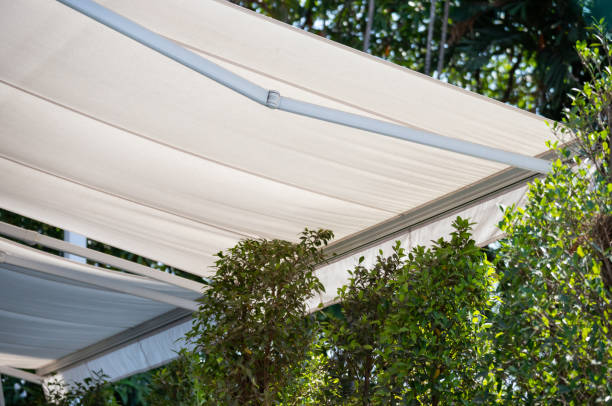 istock white awning in garden. canvas shading. 1137680955