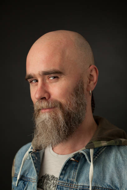 istock Studio portrait of a 40 year old bearded man on a black background 1137682698