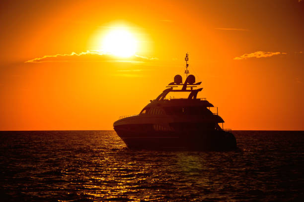 Yachtig on open sea at golden sunset view, Zadar, Dalmatia, Croatia