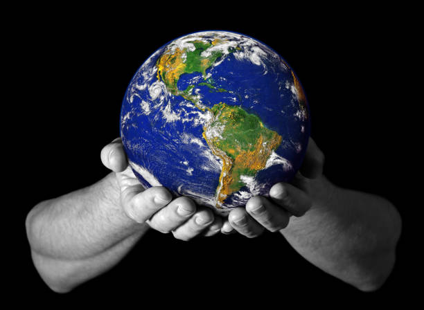 istock Hands holding the Earth with North America visible 1137683402