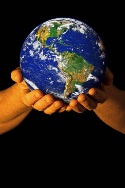 istock Hands holding the Earth with North America visible 1137683409