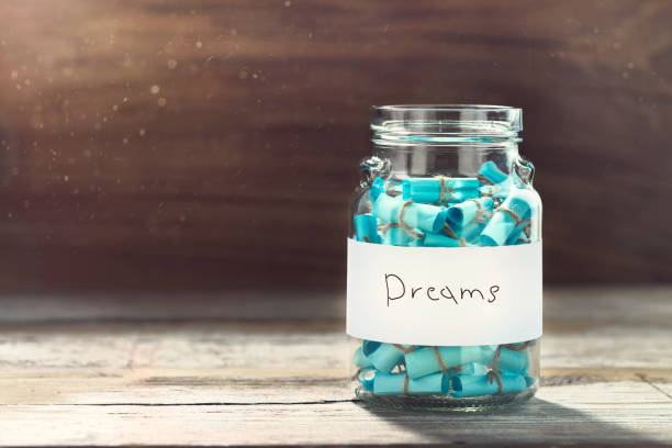 istock Dream concept Full glass jar cherished wishes 1137683618