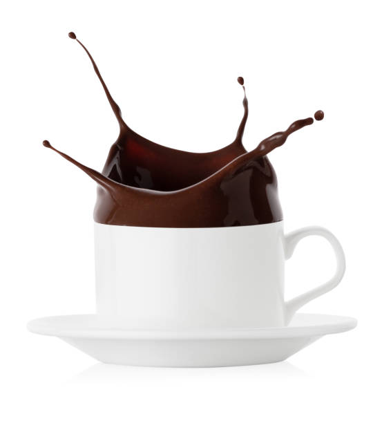 istock Splash of black chocolate in white cup and saucer 1137688111