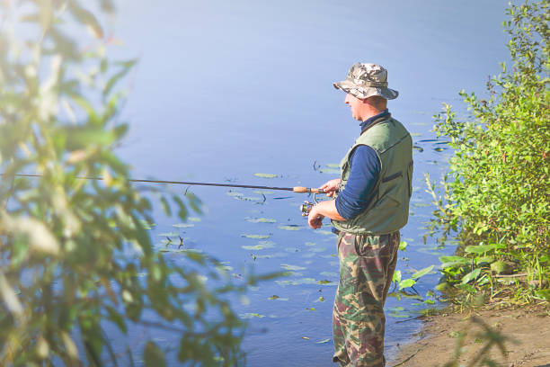 istock Man fishing. 1137692413