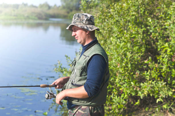 istock Man fishing. 1137692424