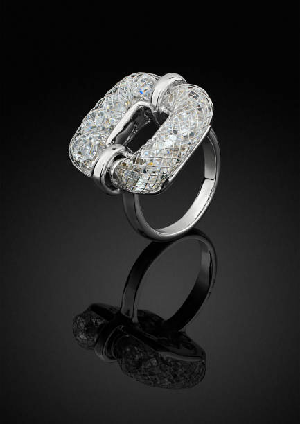 istock jewelry ring with diamonds isolated on black, clipping path 1137696500