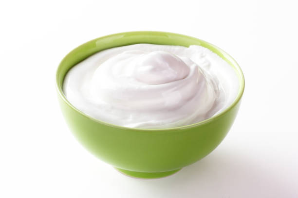 istock cream sour in a plate isolated white backround 1137699261