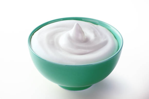 istock cream sour in a plate isolated white backround 1137699270
