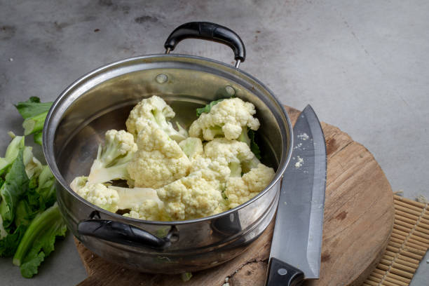 istock Fresh Cauliflower Prepare for cooking over grey table 1137700229