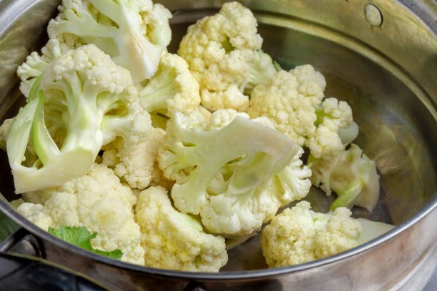 istock Fresh Cauliflower Prepare for cooking over grey table 1137700231