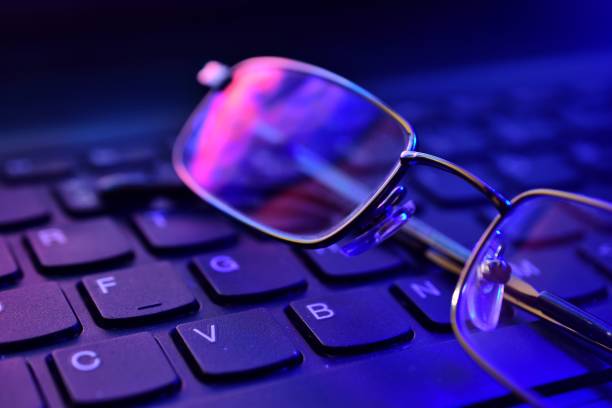 istock Close-Up Of Eyeglasses On Computer Keyboard 1137710751