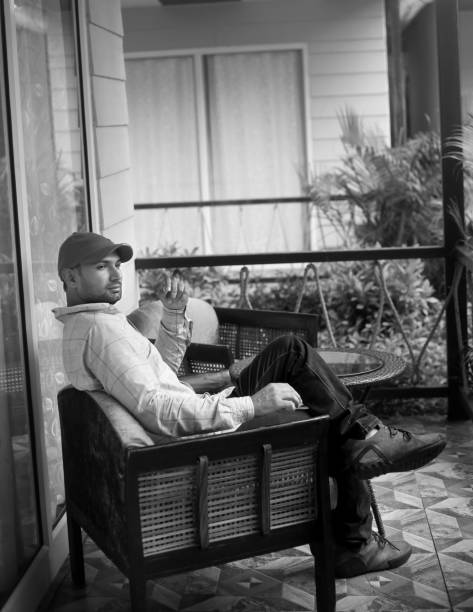 istock Young men resting or relaxing in balcony 1137717392