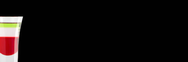 istock Alcoholic shot Kazantip on a black background. Place for text. Banner. 1137721548