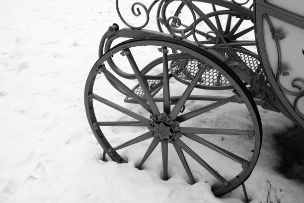 istock Wheels from the carriage, winter 1137725097