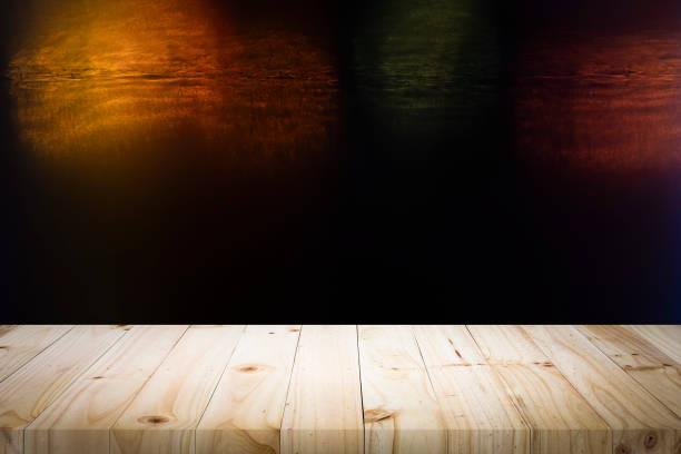 istock Wooden table with blur night bokeh background. 1137725138
