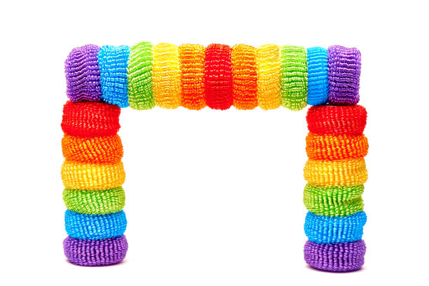Bright multicolored soft ribbons close-up on a white background.