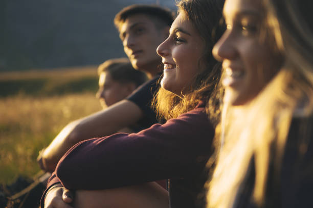 Adventures on the Dolomites: teenagers hiking Adventures on the Dolomites: teenagers hiking adolescence stock pictures, royalty-free photos & images