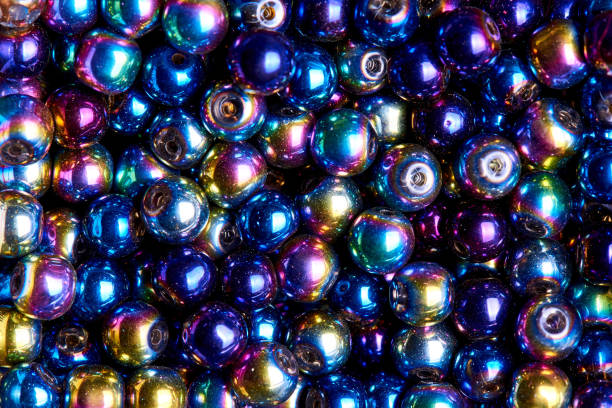 istock Background texture of multicolored iridescent beads close-up. 1137727290