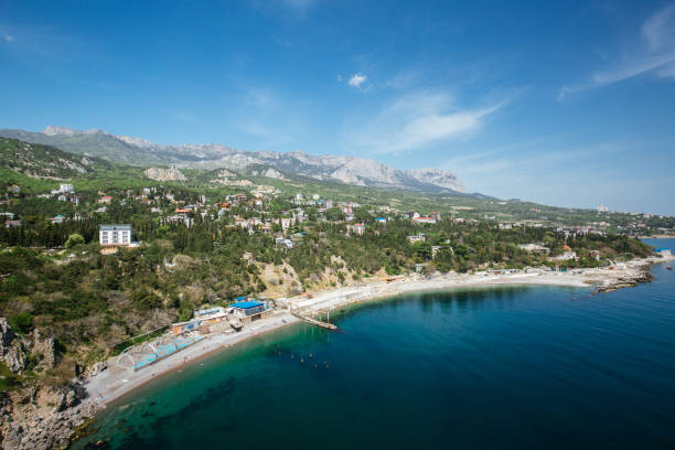 istock View from a rock at a city beach 1137728491