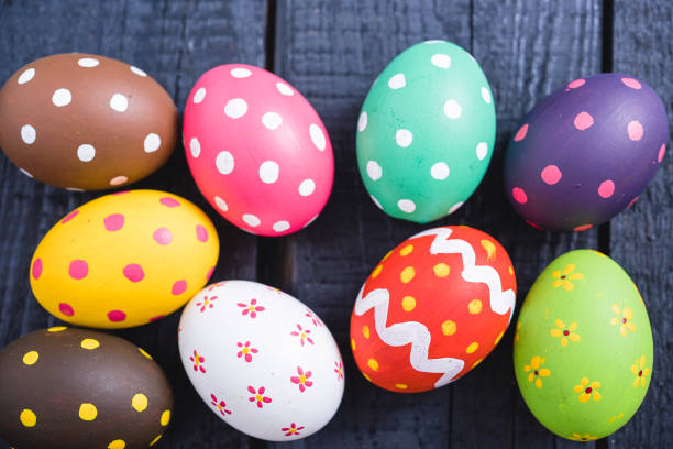 istock Easter eggs on color wooden 1137729128