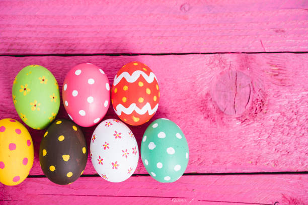 istock Easter eggs on color wooden 1137729184