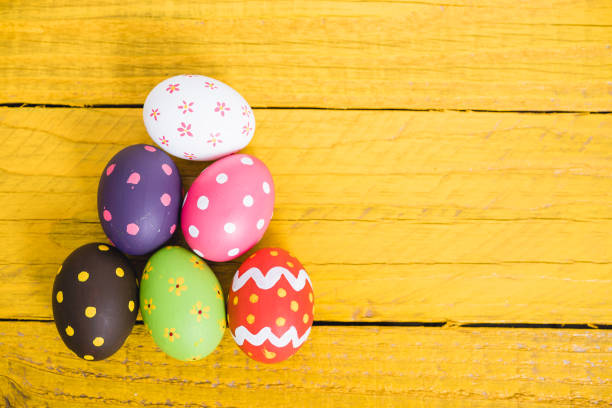 istock Easter eggs on color wooden 1137729211