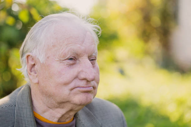 istock portrait of  elderly man in  park 1137730476