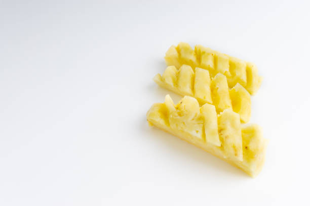 istock Pineapple with slices isolated on white background 1137734602