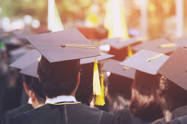 istock Group of Graduates during commencement. Concept education congratulation in University. Graduation Ceremony 1137735658