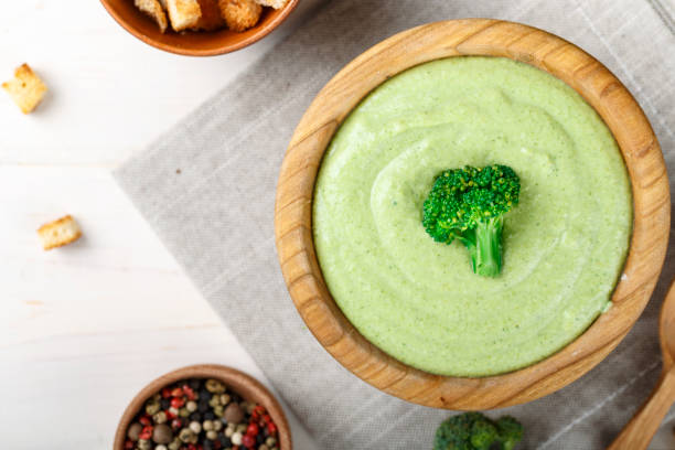 istock broccoli cream soup on a white table. nearby are spices. 1137736962