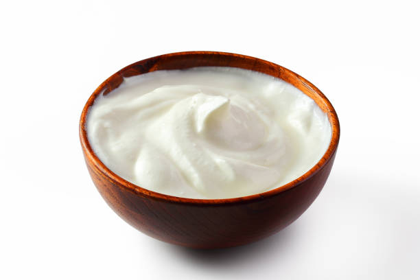 istock cream sour in a plate isolated white backround 1137739625