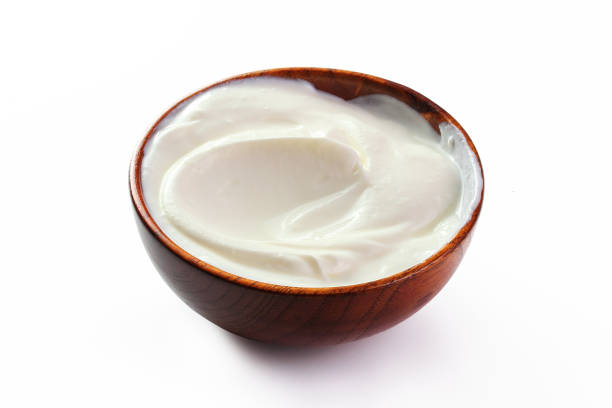 istock cream sour in a plate isolated white backround 1137739656