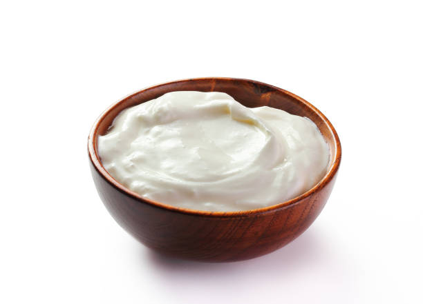 istock cream sour in a plate isolated white backround 1137739679