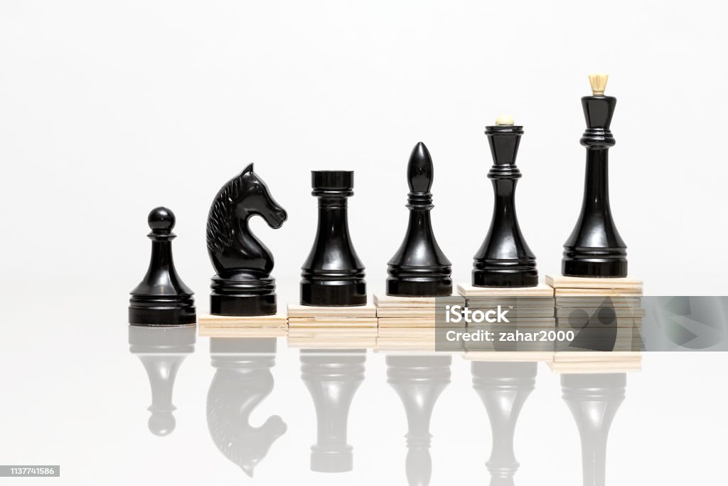 career growth on the example of chess pieces Backgrounds Stock Photo