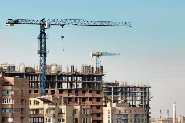 Construction of high-rise residential building in the city. stock photo