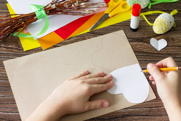 istock The child is draws details Easter postcard Easter chicken. Handmade. Project of children's creativity, handicrafts, crafts for kids. 1137744741