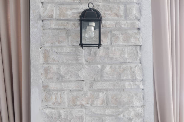 istock Black lamp beside the brick wall vintage style 1137745217