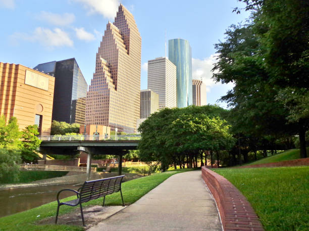 Path in Buffalo Bayou Park leading to downtown Houston, Texas, USA stock photo